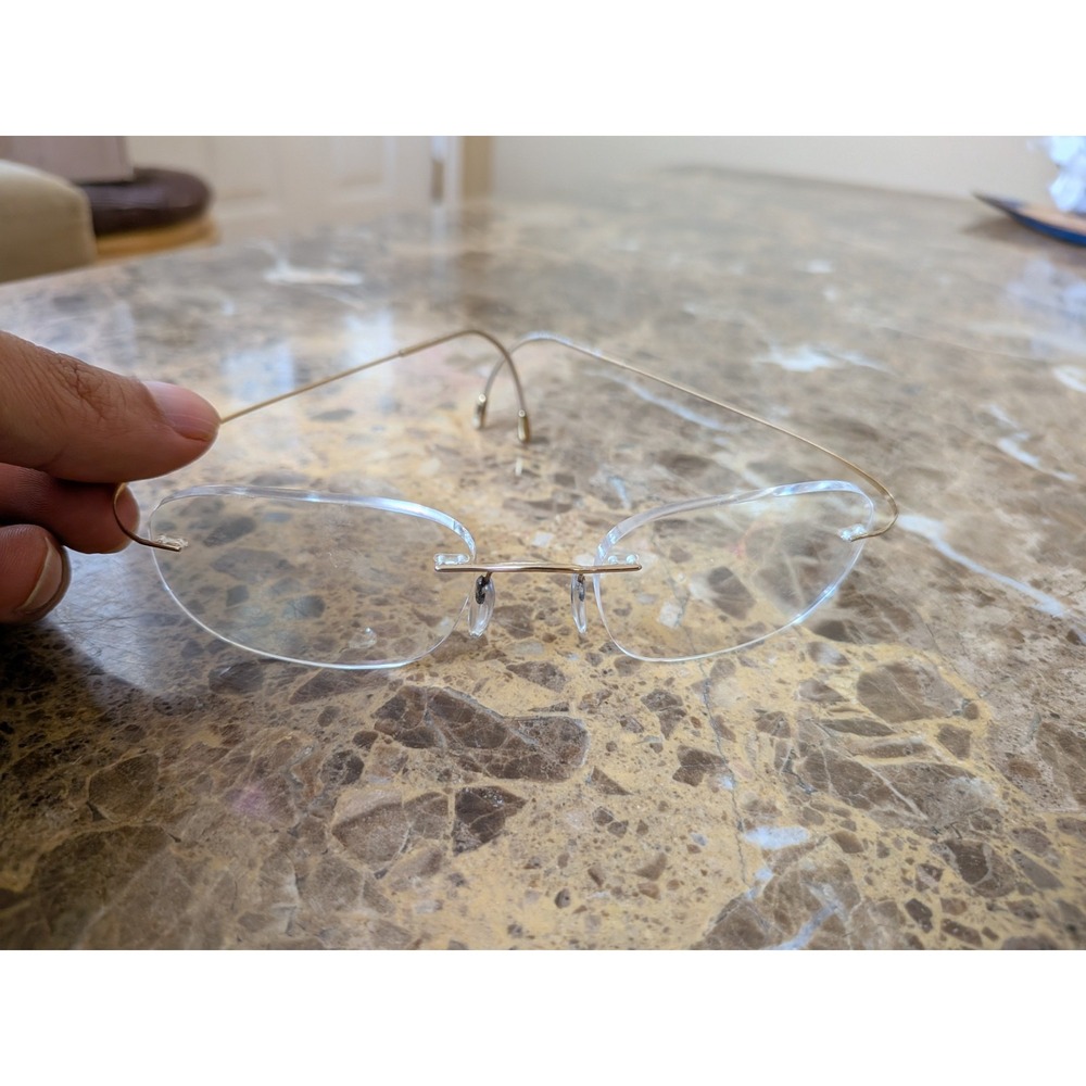 Silhouette Titan Gold Rimless Eye Glasses 7610 6051 50-21 150